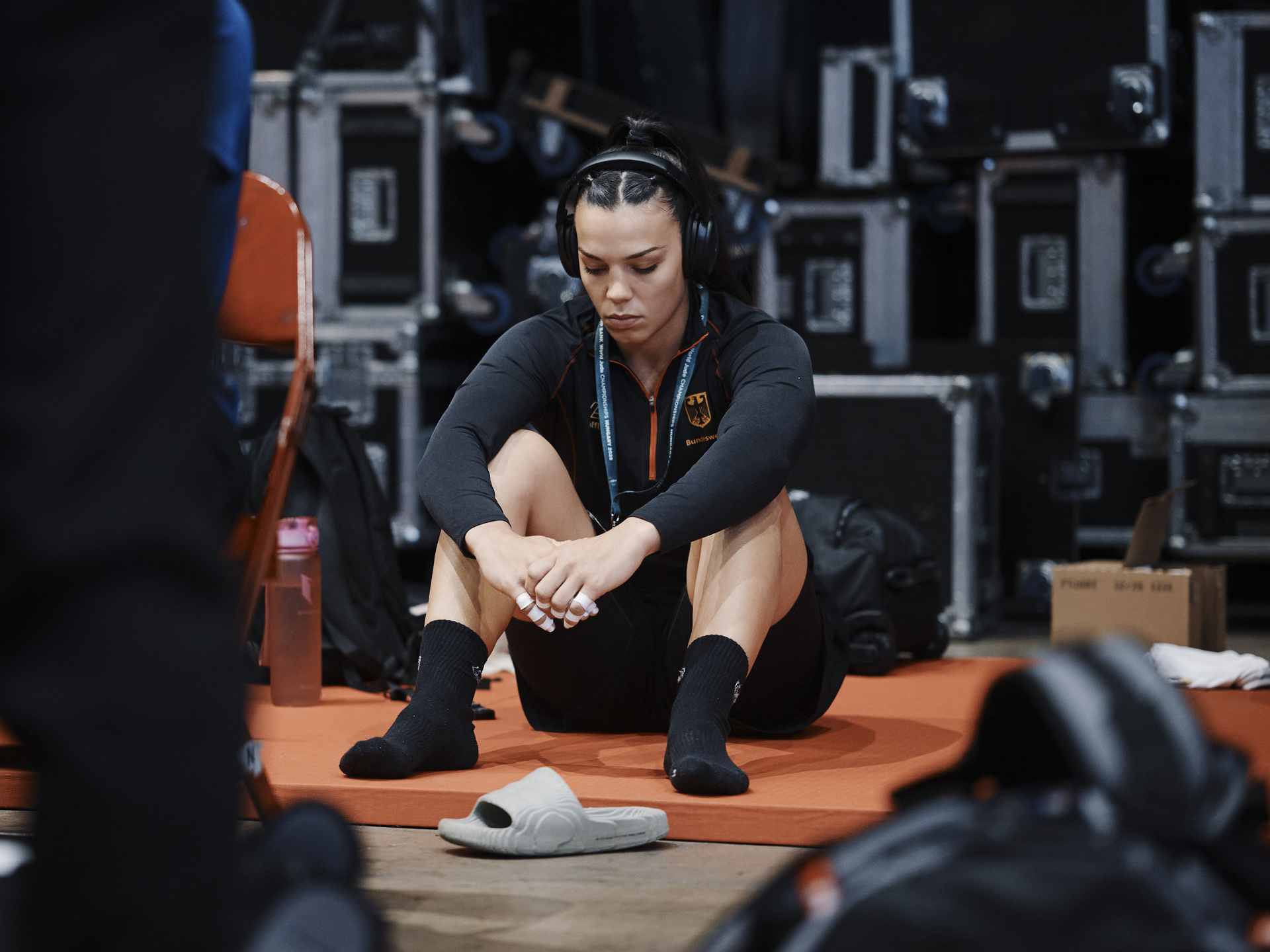 20250618_Ippongear_JudoWorldChampionships_Day06_a_warmup_mhaupt_3141 Elite judoka preparing mentally backstage at 2025 Judo World Championships Budapest